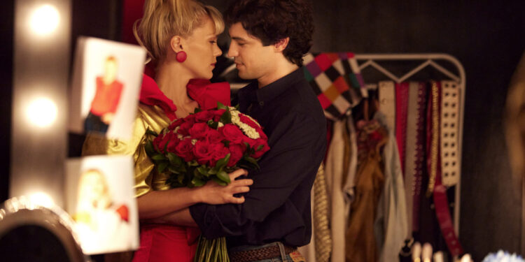 SENNA. (L to R) Pâmela Tomé as Xuxa Meneghel, Gabriel Leone as Ayrton Senna in Senna. Cr. Guilherme Leporace/Netflix © 2024